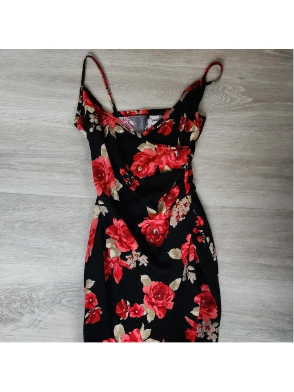 Black dress with red roses and beige leaves